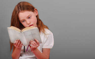 Young Girl Reading Bible