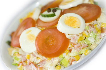 smiling salad with tomato