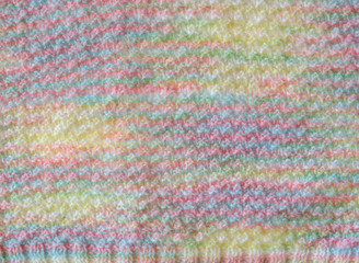 Fototapeta premium soft hand-knit baby sweater background