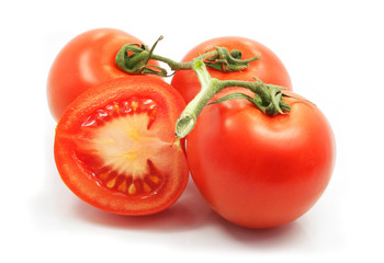 fresh tomatoes with cut on white background