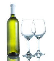 bottle and two empty wine glasses, isolated on white