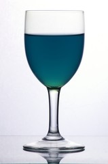 Glass of blue liquid
