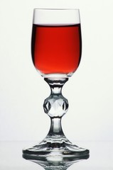 Glass of red liquid