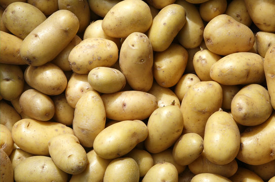 Close up of new potatoes outside a greengrocers.