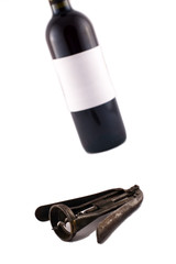 Wine bottle and corkscrew