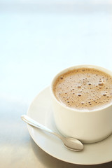 Cafe latte in coffee cup