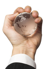 businessman holding the globe