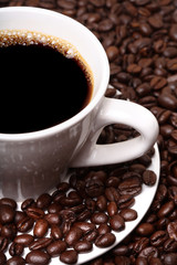 cup of coffee and coffee beans