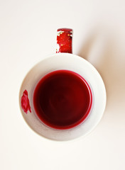 cup with red tea isolated