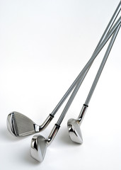 Golf clubs x3 Irons isolated on white background