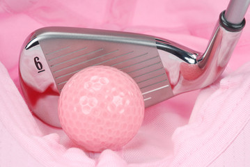 Ladies golf club, pink golfball in pink golf cap interior