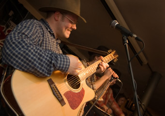 Musician with a guitar.
