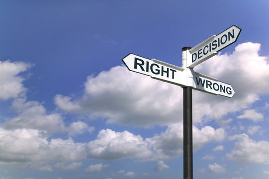 Decisions Right and Wrong sign in the sky