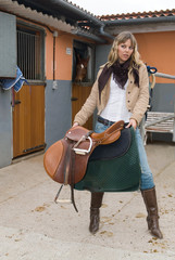 woman working in an stable