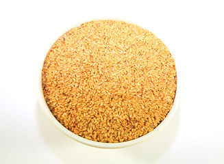 A bowl of golden linseed