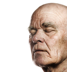 Elderly man's face over white background
