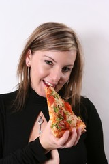 girl eating pizza