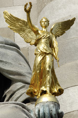 France; Paris;  golden leaf statue; bridge Alaxandre third