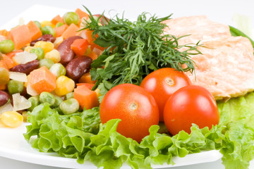 Stake from a salmon with vegetables