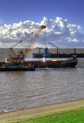 Fototapeta premium Gewässervertiefung, Schiffbagger, Bagger