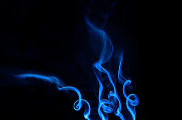 blue spirals of smoke