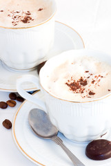 two cups of cappuccino