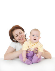 Small smiling baby with mother