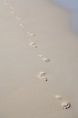 Footprints on beach sand