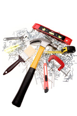 Assorted tools over white background