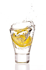 Lemon splashing in water