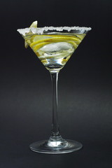 Martini with sugar crust, lemon and peels