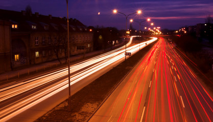 Fototapeta na wymiar City highway with blurred traffic lights