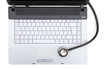 stethoscope on laptop