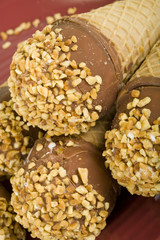 Ice Cream Cones With Milk Chocolate And Roasted Peanuts