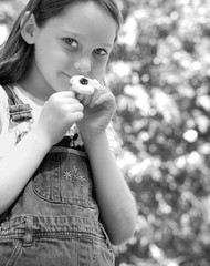 Young Girl with Wildflower