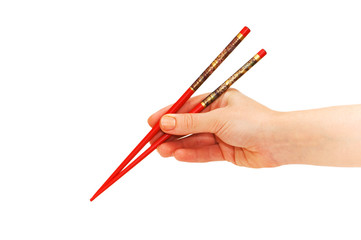 Hand holding chopsticks isolated on the white