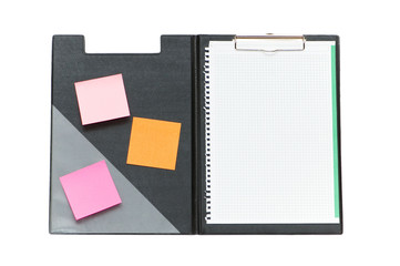 Open binder with post-it notes and blank page