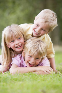 3 children playing outside