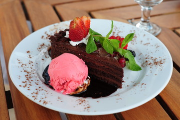 Delicious chocolate cake with garnish