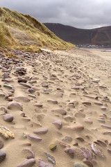 Pebbles on a sandy beach