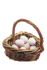 Fototapeta na wymiar White Eggs in Basket