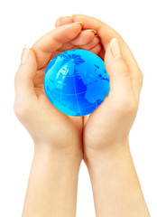 hand of the person holds globe