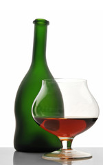 Bottle of cognac, brandy and glass