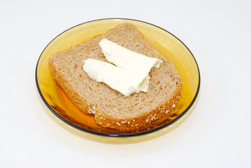 Butter on a slice of bread