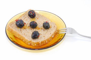 Olives on a piece of bread