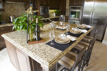 Luxury kitchen with a modern granite island.