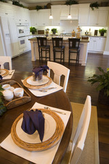 Dining table with luxury home kitchen.