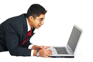 Fototapeta na wymiar Isolated Young Business Man with a Laptop