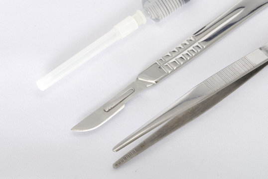 Scapel, syringe and forceps