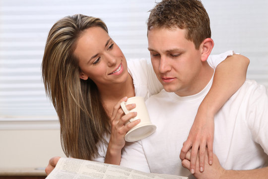 Young couple having morning coffee